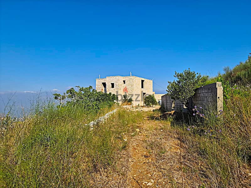 L15589-2,535 m2 Land with A Stone House For Sale in Batroun 0