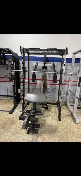 Multifunction machine nordictrack with bench like new 2