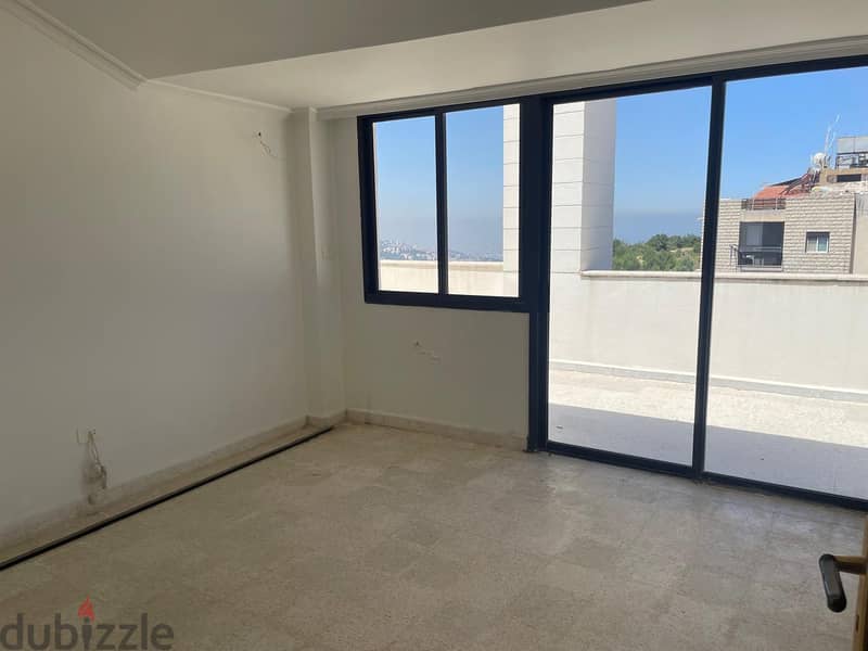 Apartment  for sale in Ballouneh شقة للبيع في بلونة 4