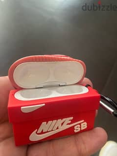 AirPods charging case apple / shoes