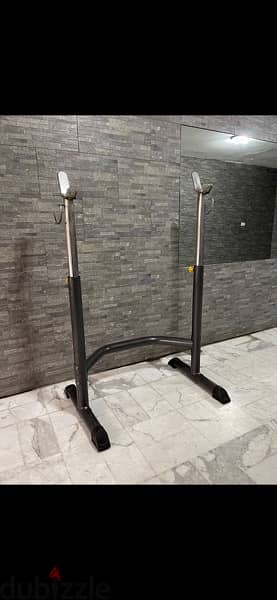 Benche and squat rack like new heavy duty 0