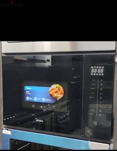 Midea built in oven 25L - New in box - Mint condition