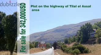 Land on Tilal El Aassal highway for sale