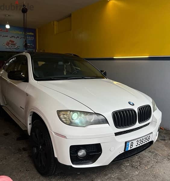 BMW X6 2009 xDrive35i White on Black 9