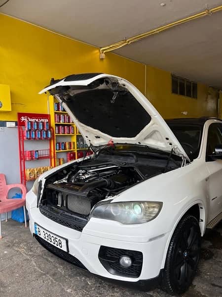 BMW X6 2009 xDrive35i White on Black 11