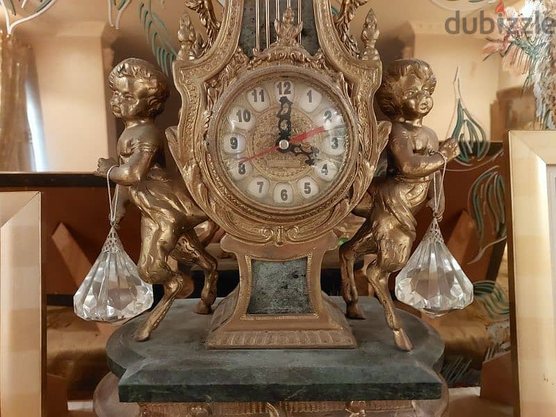 ساعة و شمعدانين Clock and 2 Candlesticks 7