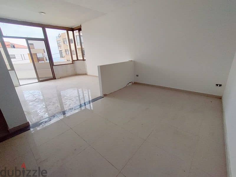 Catchy apartment for sale 125m²+100m²terrace in Halat Jbeil 3