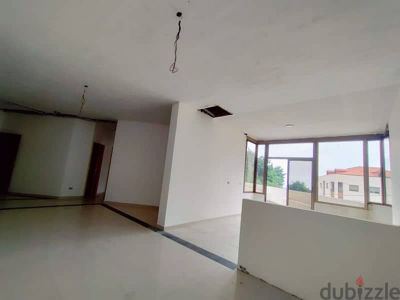 Catchy apartment for sale 125m²+100m²terrace in Halat Jbeil 4