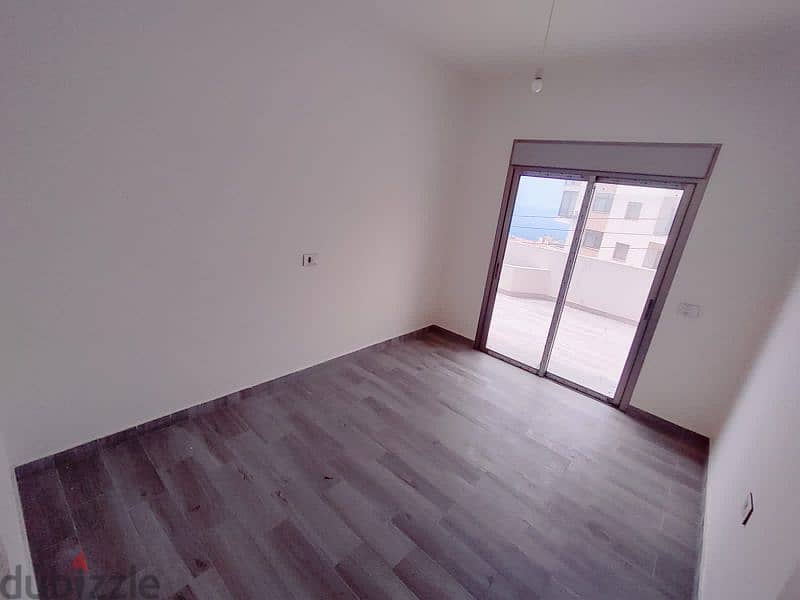 Catchy apartment for sale 125m²+100m²terrace in Halat Jbeil 6