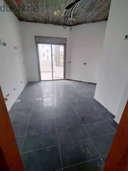 Catchy apartment for sale 125m²+100m²terrace in Halat Jbeil 9