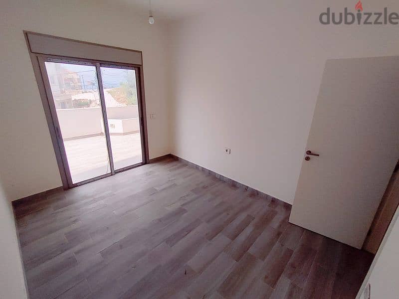 Catchy apartment for sale 125m²+100m²terrace in Halat Jbeil 11