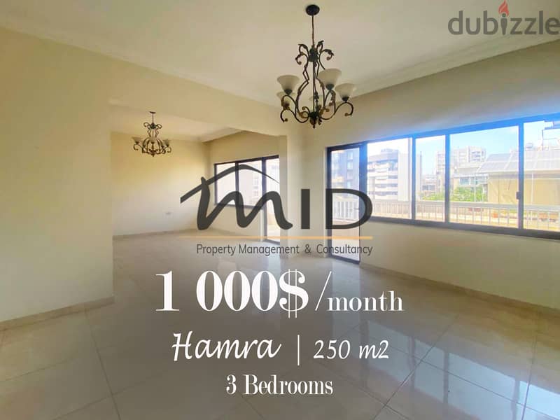 Hamra | Spacious 3-Bedroom Apartment | Huge Balcony | Prime Location 1