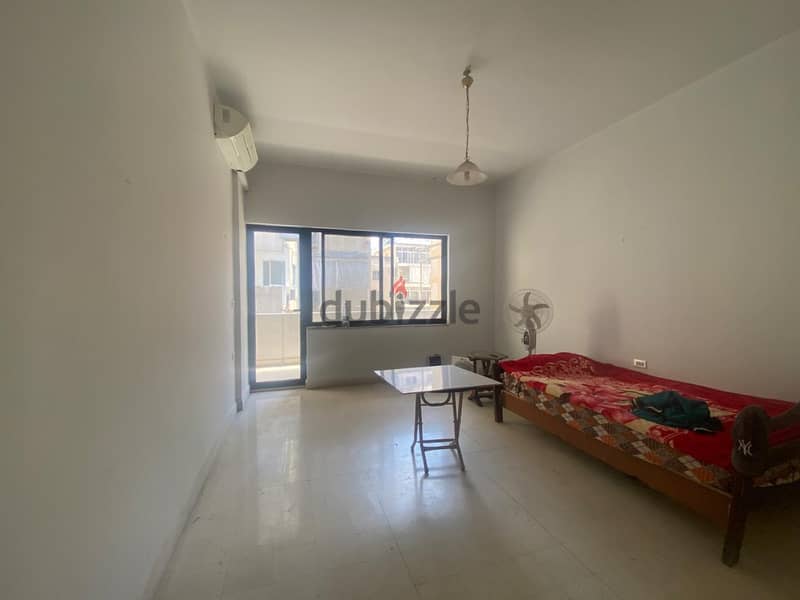 Hamra | Spacious 3-Bedroom Apartment | Huge Balcony | Prime Location 3