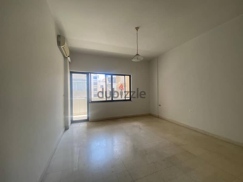 Hamra | Spacious 3-Bedroom Apartment | Huge Balcony | Prime Location 7