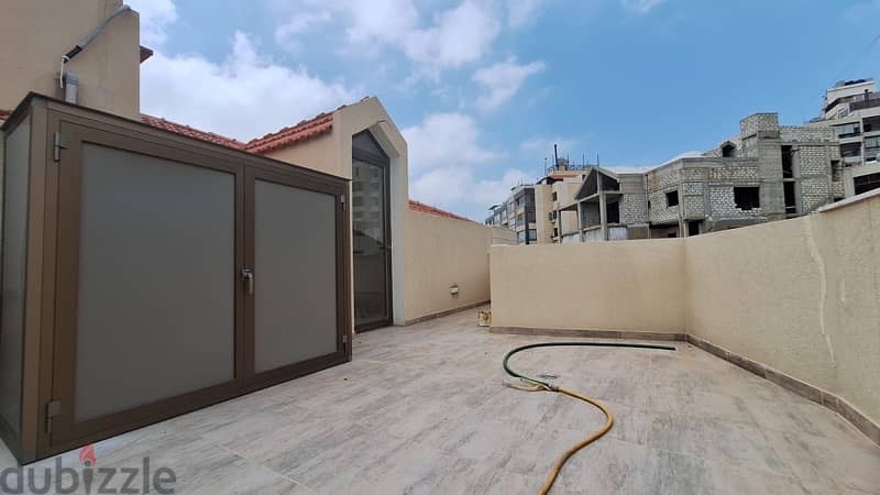 Furnished Rooftop Apartment with terraces & open views  in Biaqout. 8