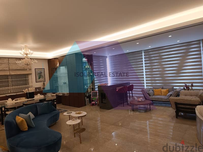 A decorated 260 m2 apartment having an open sea view for sale in Adma 1