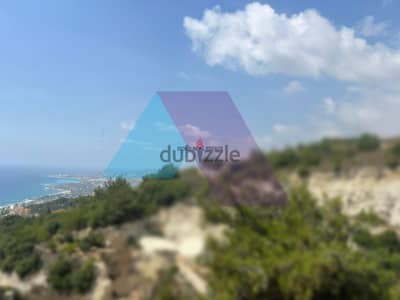 A 918 m2 land having an open mountain/sea view for sale in Halat