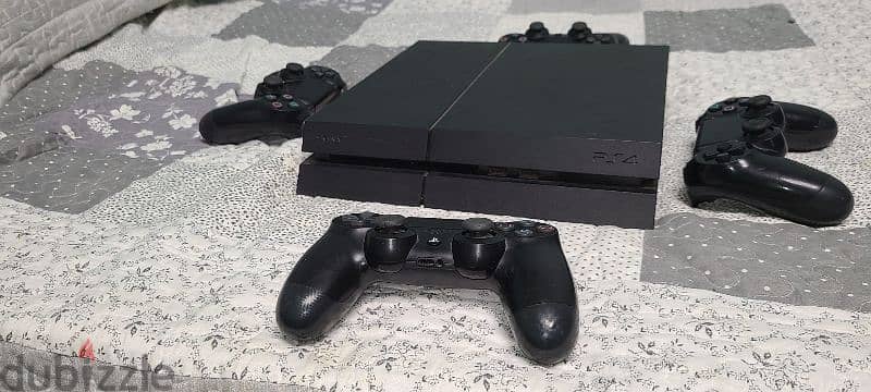 ps4 (fat) with 4 joysticks and fifa 24 1