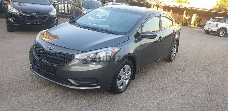 Kia Cerato 2014 source company f. o like new 1