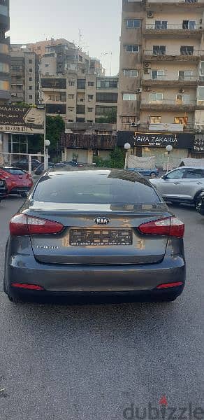 Kia Cerato 2014 source company f. o like new 2