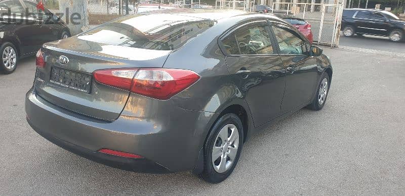 Kia Cerato 2014 source company f. o like new 4