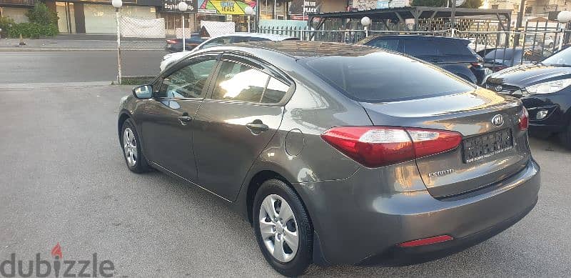 Kia Cerato 2014 source company f. o like new 5