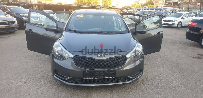 Kia Cerato 2014 source company f. o like new 15