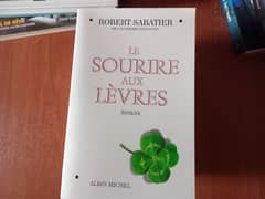 roman , book, le sourire aux levres, 10$