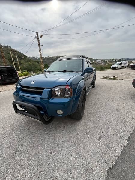 Nissan frontier supercharger 2002 اجنبي 6