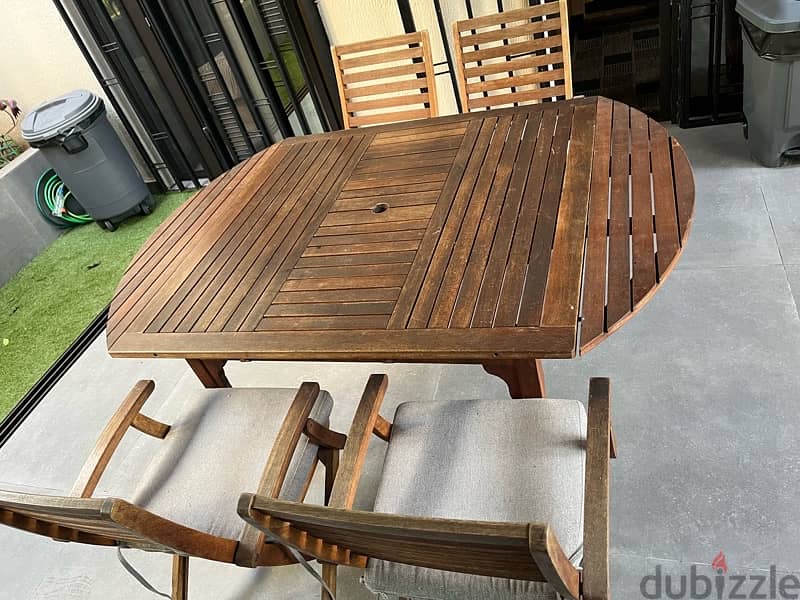 Teak table & 4 chairs 1