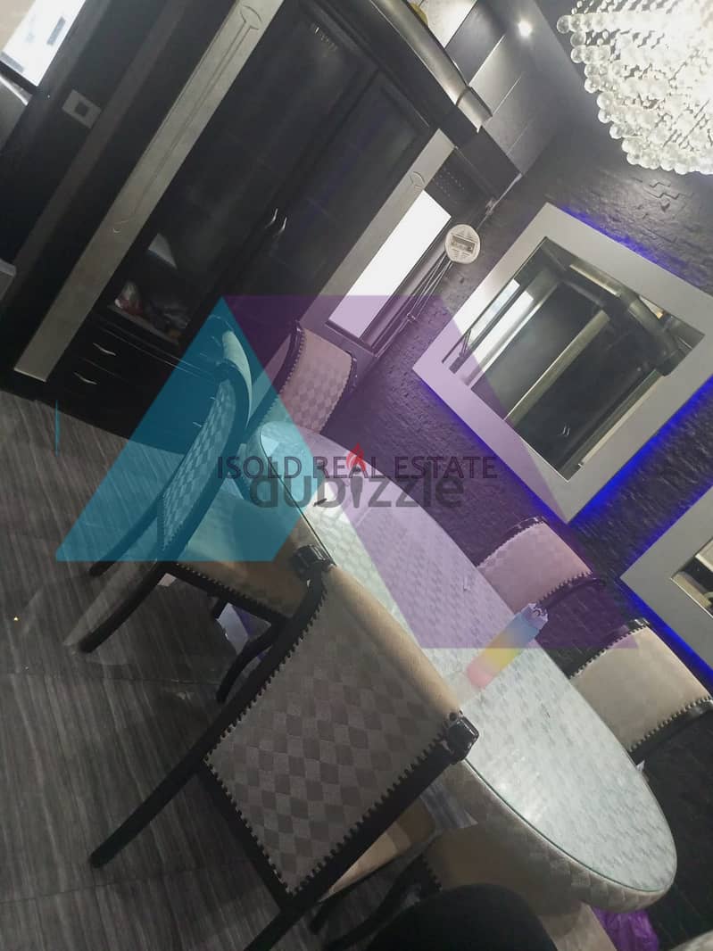 Fully furnished 130m2 apartment having an open view for rent in Bsalim 3