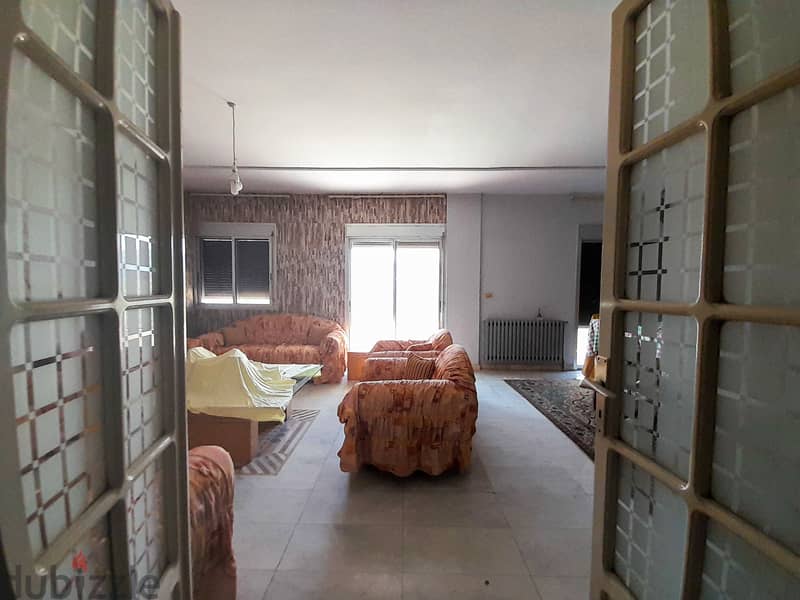 180 SQM  Furnished Apartment in Ballouneh with Mountain View 1