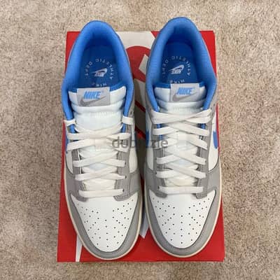 Authentic Nike Dunk Low Athletic Department university blue.