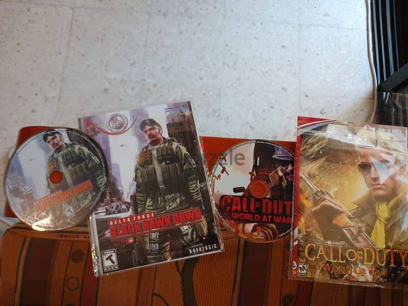 Call of Duty and Black Hawk PS2 CD games 0