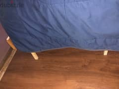 Wood and metal single bed with mattress. 0