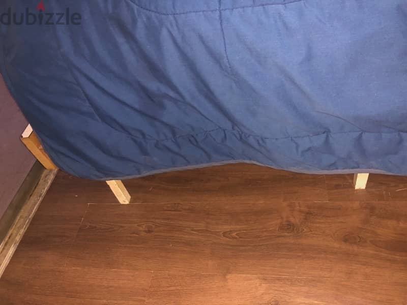 Wood and metal single bed with mattress. 0