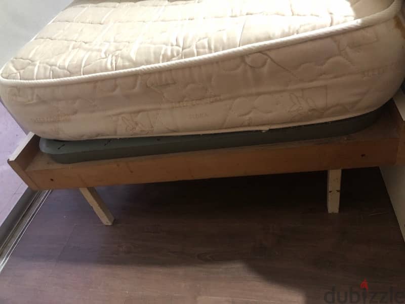 Wood and metal single bed with mattress. 1