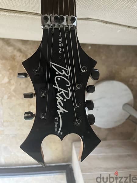 BC rich warlock 7 strings guitar looking to trade 1