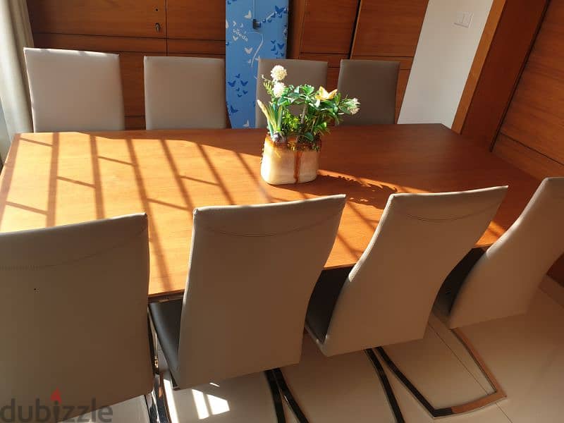 Dinning table with 8 leather chairs 2