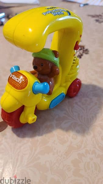 VTECH push and sing tricycle 1