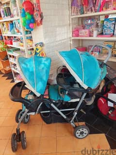 عرباية توأم /طفلين مستعملةbabylove brand twins stroller 0