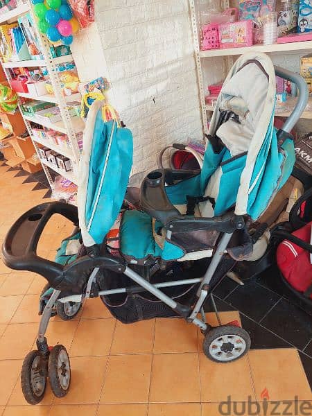 عرباية توأم /طفلين مستعملةbabylove brand twins stroller 1