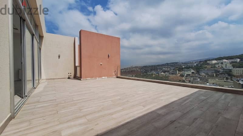 Duplex apartment with terrace and open views in Fanar. 0