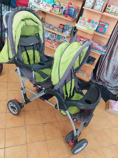 عرباية توأم او لطفلين مع طاولتين اكل وبتتنيم وتتجلس twins stroller