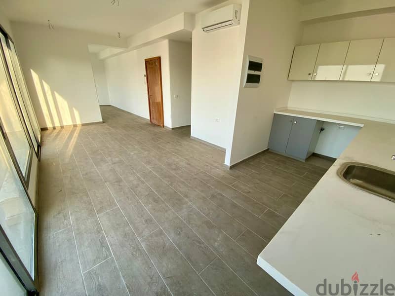 BRAND NEW IN ACHRAFIEH WITH SEA VIEW (150SQ) 2 MASTER BEDS ,  (AC-859) 1