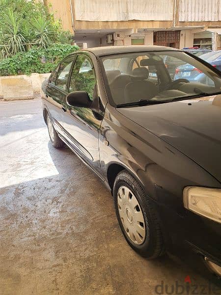 Nissan Sunny 2011 4