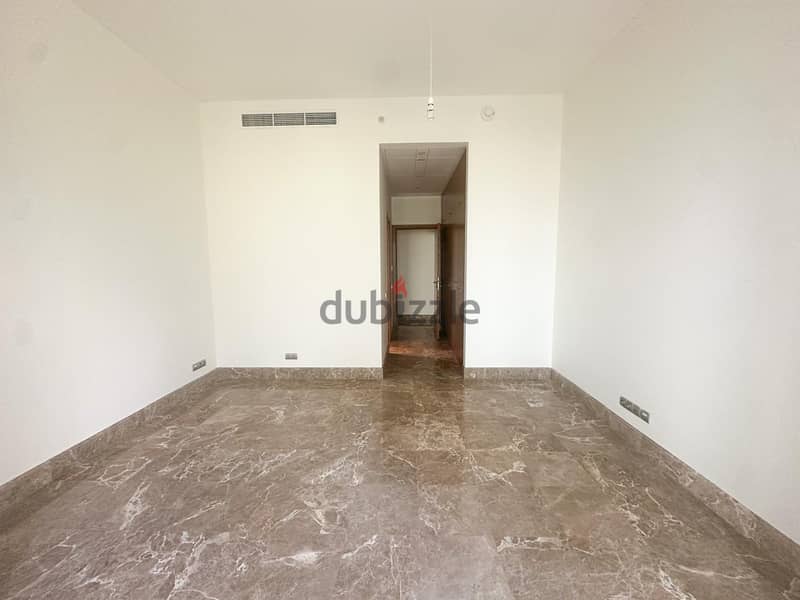 Spacious 4-Bedroom Apartment with Sea View for Sale in Downtown 7