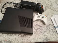 Xbox 360 with 2 controllers and several games 0