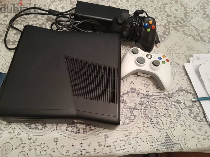 Xbox 360 with 2 controllers and several games 1