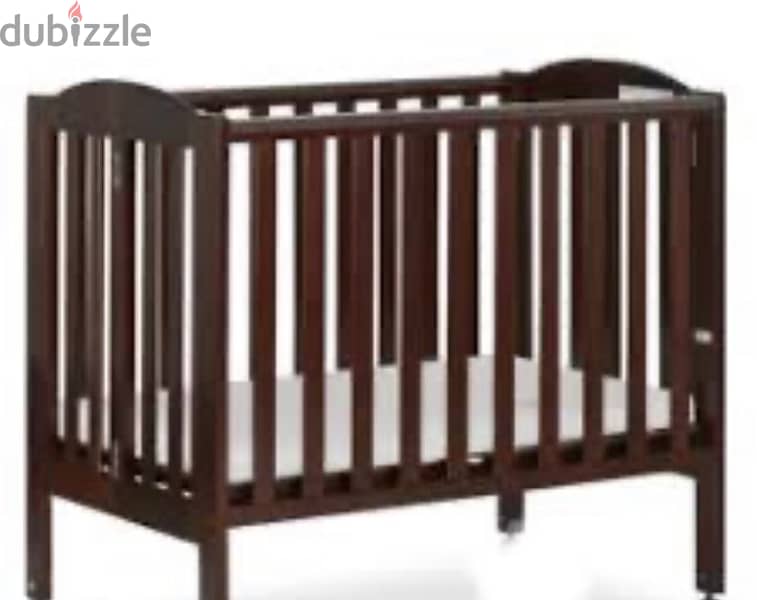 wooden crib with mattress 0